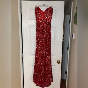 Red and silver sparkly Primavera prom dress